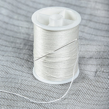 How to sew a patch onto a conductive jacket